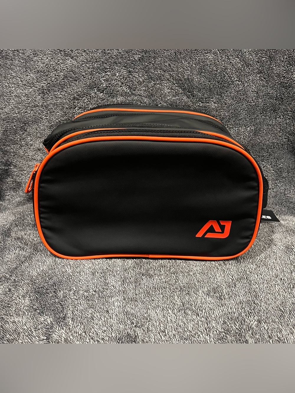 Atley James Harmon toiletry organizer bag black and orange